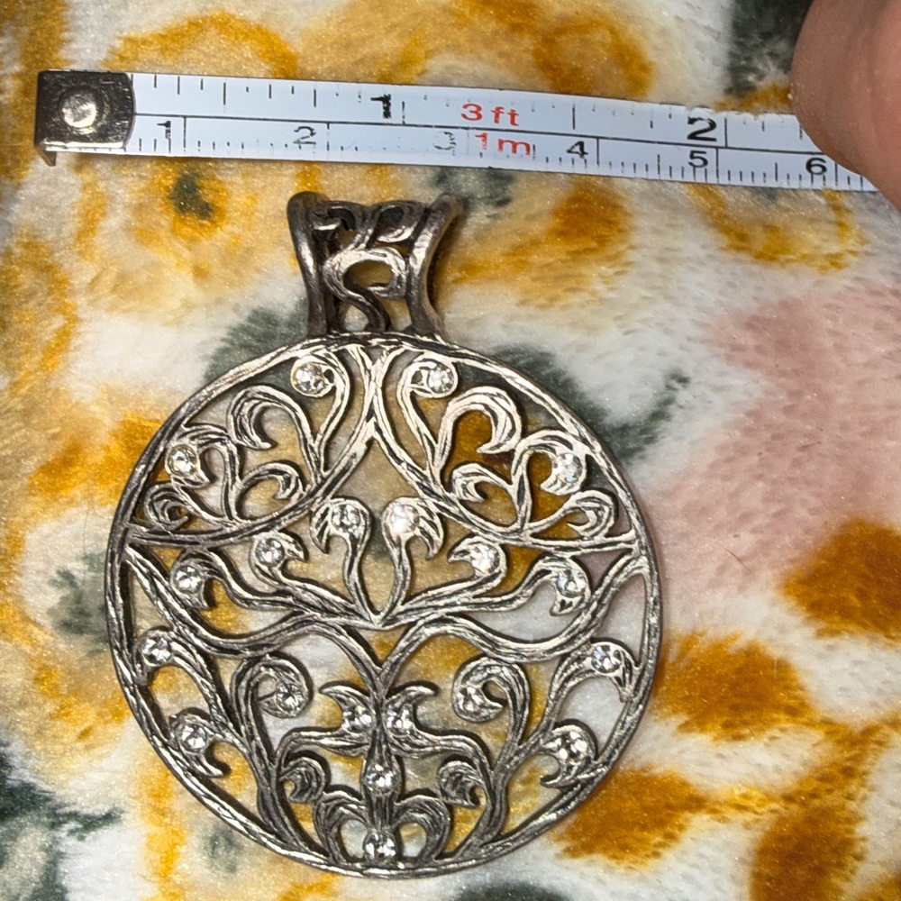 Ornate Filigree Crystal Pendant - Silver Tone with Yellow Backing